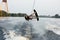 Wakeboarder jumping upside down