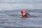 Wakeboarding. Girl wakeboarder falls into the water after an unsuccessful jump