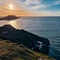 Wales Swansea, UK. Dragon\\\'s Rest: A Majestic Worm\\\'s Head Sunset in Wales