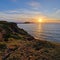 Wales Swansea, UK. Dragon\\\'s Rest: A Majestic Worm\\\'s Head Sunset in Wales