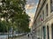 Walk along the boulevard des invalides one summer afternoon in paris, an extraordinary sky and the dome of the hotel des invalides