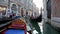 Walk along the canals in a gondola in Venice