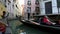 Walk along the canals in a gondola in Venice