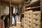 Walk in closet with organized clothing