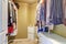 Walk in closet with organized clothing