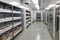 walk-in freezer with rows of frozen foods and packaged goods