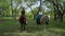 Walk of the girls on horseback in the woods