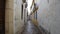 Walk through a narrow alley