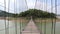 Walk on the suspension bridge on the river