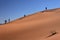 Walkers in a desert landscape