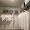 A walkin master bedroom closet in a condominium model home in Orlando, Florida