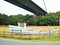 Walking along the River Humber uk under the Humber Bridge.