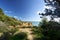 Walking along the sandy beaches and cliffs in Praia Do Alemao, Portimao in Algarve, southern Portugal