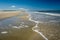 Walking along the Schiermonnikoog coastline on a summer afternoon Netherlands