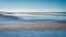 Walking along the Schiermonnikoog coastline on a summer afternoon Netherlands