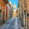 Walking around the old streets of  baroque town Ragusa Ibla in Sicily