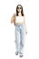 Walking and arriving young stylish woman in jeans gesturing and talking at camera