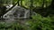 Walking through beautiful waterfall among the freshness of greenery forest under the shade of the trees in summer morning.