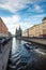 walking boat moves through the channel Griboyedov on the background Church of the Savior on Blood