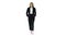 Walking businesswoman with hands in pockets on white background.