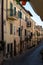 Walking in Castel Gandolfo, summer residence of pope, view on green Alban hills overlooking volcanic crater lake Albano, Castelli