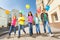 Walking children diversity with colorful balloons