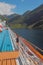 Walking deck of cruise liner in fjord. Geiranger, Norway