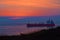 Walking in the dunes, seeing a ship in the evening in autumn