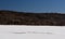 Walking on a great lake in december in the canadian forest in Quebec