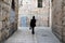 Walking man in Jewish Quarter of Jerusalem.