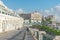 Walking man on a paved road in Algiers city.