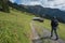 Walking man in swiss landscape