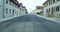 Walking in the middle of the road small town in europe germany street with blacktop road