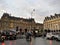 Walking in Paris afternoon sunset. Train station building.