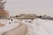 Walking path along Canadian history museum and surroundings on a cold winter day with snow