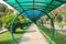 a walking path with covered domes on the campus of Vietnam National University Ho Chi Minh