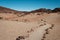 Walking path in desert landscape - walkway in rocky desert