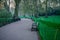 Walking path with many benches in St James Park early in the morning