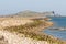 Walking path to lighthouse in Howth Pier with Irelands Eye Island in background