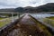 Walking path on top of hydroelectric dam wall in Scotland