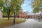 a walking pave behind Oslo Church through foliage trees