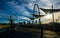 Walking on Pedestrian Bridge near Downtown Dallas Texas as the Sun beams sunrays over the Margaret Hunt Hill Bridge