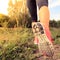 Walking or running legs in forest, adventure and exercising