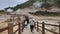 Walking on the Sikidang crater in Dieng, Wonosobo, Central Java, Indonesia