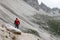 Walking summer trekking in the Dolomites. People in the mountains. Mountain view Italian Alps.