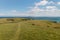 Walking track across grassy hills