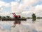 Walking Tractor on rice field for work plow farmland prepared for cultivation agricultural