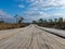 Walking trail in Kemeri moorland, early spring day, Kemeri national park