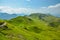 Walking trail on the ridge from Klingenstock peak to Fronalpstock peak above the small village of Stoos