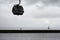 Walking way at Tagus riverside with cable car railway in Parque das Nacoes